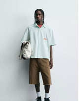 Striped Shirt With Contrast Slogan Green | Zara
